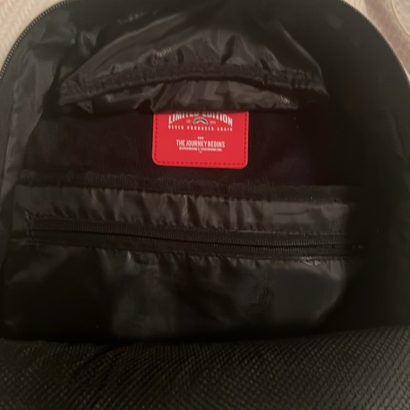 Sprayground Black and White Shark Mouth Backpack
